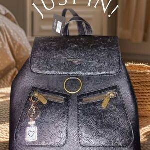 Elegant Black Textured Backpack with Gold Details